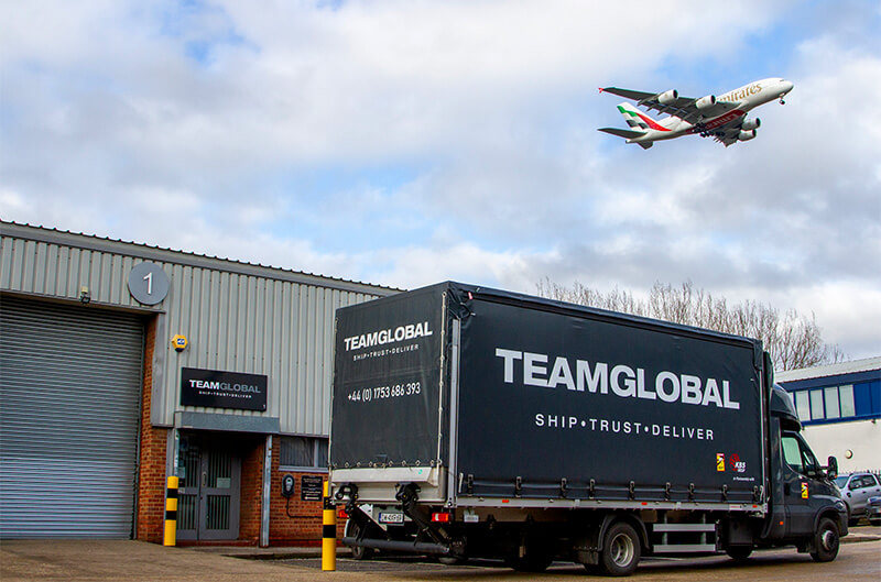 Team Global van with plane